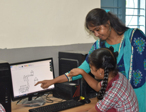 Student of class 9th showing her drawing to Kriti’s Computer trainer